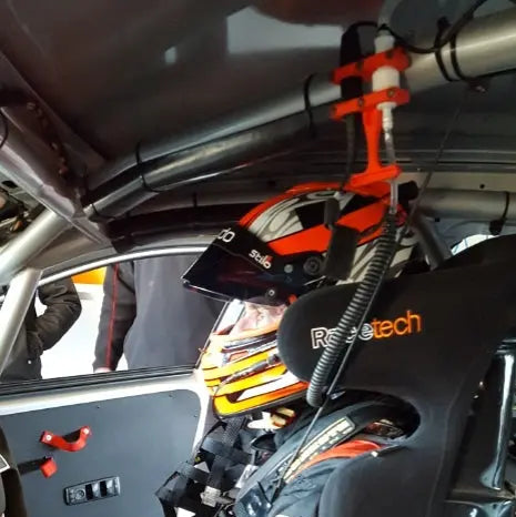 race driver quick connection , quick release roll bar mount shown in a race car ready to use